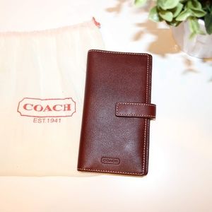 Small brown leather Coach credit card wallet